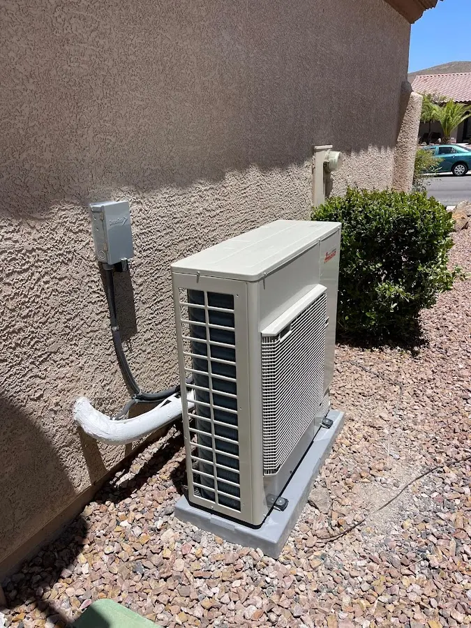 Residential air conditioning condenser unit in Sumpter